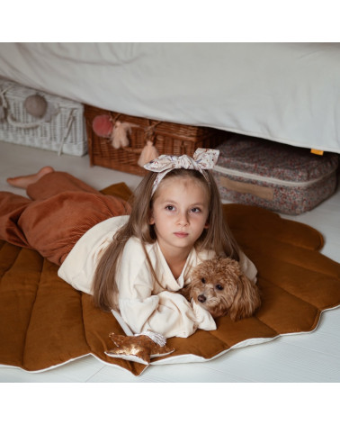 Tapis de jeu en forme de coquillage caramel